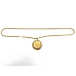 A 1915 SOVEREIGN in a 9 carat gold pendant mount, on a 9 carat gold rope link chain, 51cm long,