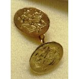 A PAIR OF 18 CARAT GOLD CUFFLINKS Birmingham 1908, the oval monogrammed panels with chain