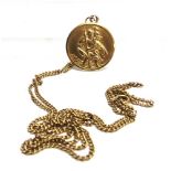 A SAINT CHRISTOPHER PENDANT stamped '750', on a chain also marked '750', 15g gross