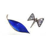 A DAVID-ANDERSEN BLUE ENAMEL LEAF BROOCH and a Norwegian stylised butterfly brooch