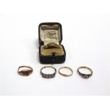 A 22 CARAT GOLD WEDDING RING a ring stamped '9ct & PT'; another; a 9 carat gold signet ring; and a 9