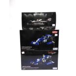 THREE 1/18 SCALE FORMULA 1 RACING CARS comprising a Minichamps Brabham B.M.W. BT52 (N. Piquet),