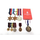 A SECOND WORLD WAR & LATER GROUP OF FOUR MEDALS TO ROLAND HEWLETT WIDDOWS, ROYAL NAVY comprising the
