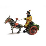 [TINPLATE]. A CIRCUS CLOWN PONY CART brightly lithographed, with a clockwork mechanism (working),