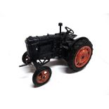 A CHAD VALLEY FORDSON MAJOR TRACTOR dark blue with orange hubs, with a clockwork mechanism,