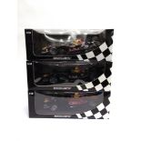 THREE 1/18 SCALE RED BULL FORMULA 1 RACING CARS comprising a Minichamps Red Bull Racing Cosworth RB1