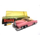 A DINKY NO.100, LADY PENELOPE'S FAB 1 pink, cast hubs, excellent condition, complete with two