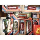 TWELVE 1/76 SCALE MODEL BUSES of London interest, each mint or near mint and boxed.