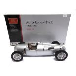 A 1/18 SCALE CMC NO.M034, AUTO-UNION TYC C, 1936-1937 silver, mint or near mint, boxed.