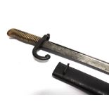 A FRENCH M1866 'CHASSEPOT' YATAGHAN SWORD BAYONET the back-edge of the blade inscribed 'Mre d'