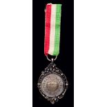An historic medal from the first Italian National Football Championship in 1898 awarded to a player