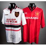 Eric Cantona and Ryan Giggs signed Manchester United replica jerseys, the Cantona a red 1996 F.A.