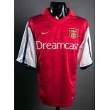 A red & white Arsenal replica jersey signed by the 2001-02 double-winners,