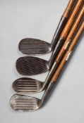 Four 'illegal' ribbed-faced irons, including an example by McGregor of Dayton, Ohio,