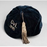 A blue Glasgow representative football cap 1895, the dark blue cap inscribed G v L, 1895,