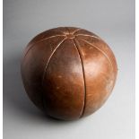 A 19th century leather gymnasium medicine ball, eight panels and button tops, diameter 30.5cm.