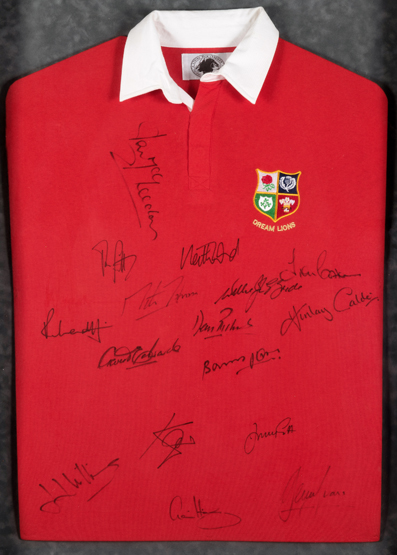 A signed Dream Lions rugby shirt, signatures in black marker pen, comprised Johnny Smith,