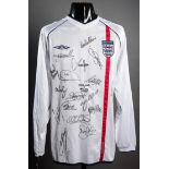 A team-signed white England v Brazil 2002 World Cup replica jersey,