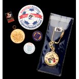 Six football badges/medals, comprising: a Football Association 1863-1963 centenary lapel badge,