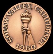 A Squaw Valley 1960 Winter Olympic Games participant's medal, bronze, 50mm.