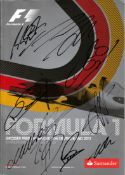 2011 German GP programme signed by Michael Schumacher, Lewis Hamilton & seven others,