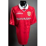 A multi-signed Manchester United 1999 Champions League Final commemorative jersey,