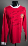 A signed red Manchester United 1968 retro jersey,