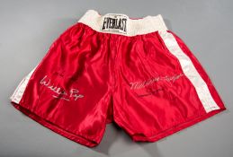 Boxing trunks signed by Willie Pep, Carlos Ortiz, Meldrick Taylor & Carmen Basilio,