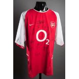 An Arsenal replica home jersey signed by the 2003-04 'invincibles' team,