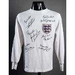 A TOFFS white England retro jersey signed by England's top six all-time international goalscorers,