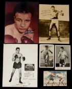 An album of boxing autographs, mostly signed pictures, one postcard, one album page,