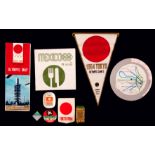 A collection of Olympic Games memorabilia, including a Mexico 1968 athlete's participant's badge,