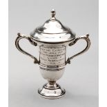 A small silver trophy cup won by the celebrated Welsh-born Olympic water polo player and swimmer