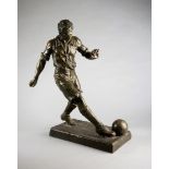 An unusually large spelter figure of a footballer, signed Ruffony and stamped FRANCE to the base,