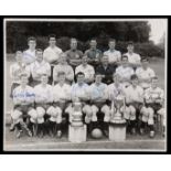 An autographed Tottenham Hotspur 1960-61 double winning team photograph, original 8 by 10in.