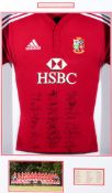 A framed British & Irish Lions shirt signed by the 2009 touring team to South Africa,