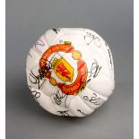 A Manchester United souvenir club football signed by the 1999 Treble Winning team,