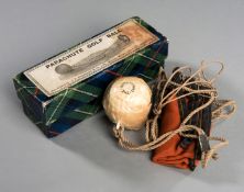 A rare boxed & unused Parachute Golf Ball by J P Cochrane of Edinburgh circa 1896,