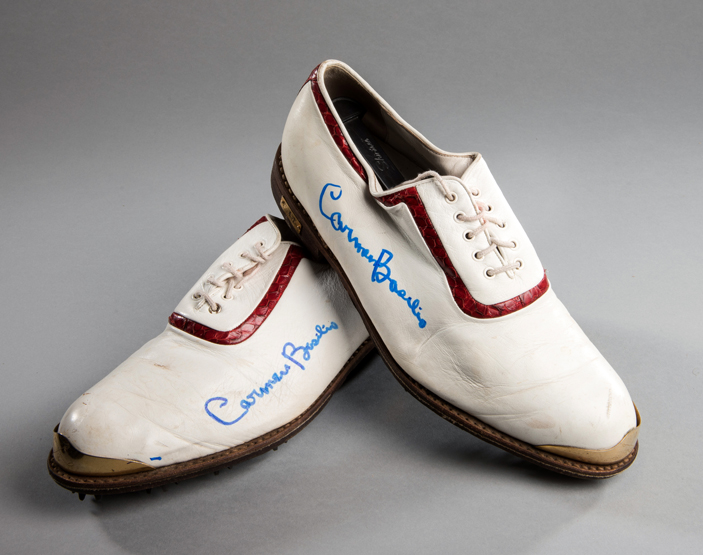 Boxer Carmen Basilio's personally owed and signed golf shoe cleats,