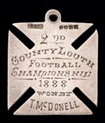 A very early Irish Gaelic Football medal awarded for the 1888 Louth Senior Football Championship,