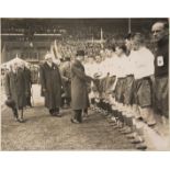 Original photograph of King George V shaking hands with the Huddersfield Town players before the