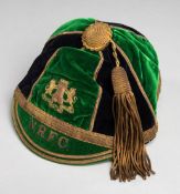 Green & black quartered Northampton Rugby Union cap,