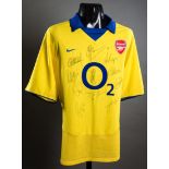 A yellow Arsenal away replica jersey signed by the 2003-04 'invincibles' team,