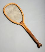 A 'Tournament 3' lawn tennis racquet by Bussey & Co circa 1896, with a striking fishtail,