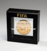 FIFA 2010 World Cup draw medal presented to Pelé,