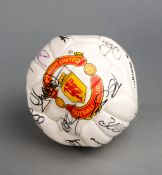 A Manchester United souvenir club football signed by the 1999 Treble Winning team,