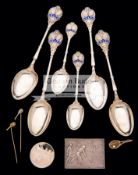 A set of six silver & enamel tennis spoons, four larger than is usual,