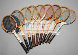 A group of nine tennis racquets featuring portraits and 'autographs' of Grand Slam tennis champions,