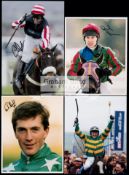 An album of signed photographs of National Hunt jockeys, in sleeves in a ring binder file,