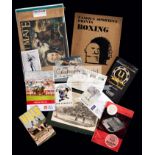 A large and varied collection of sports memorabilia mostly from the modern era,